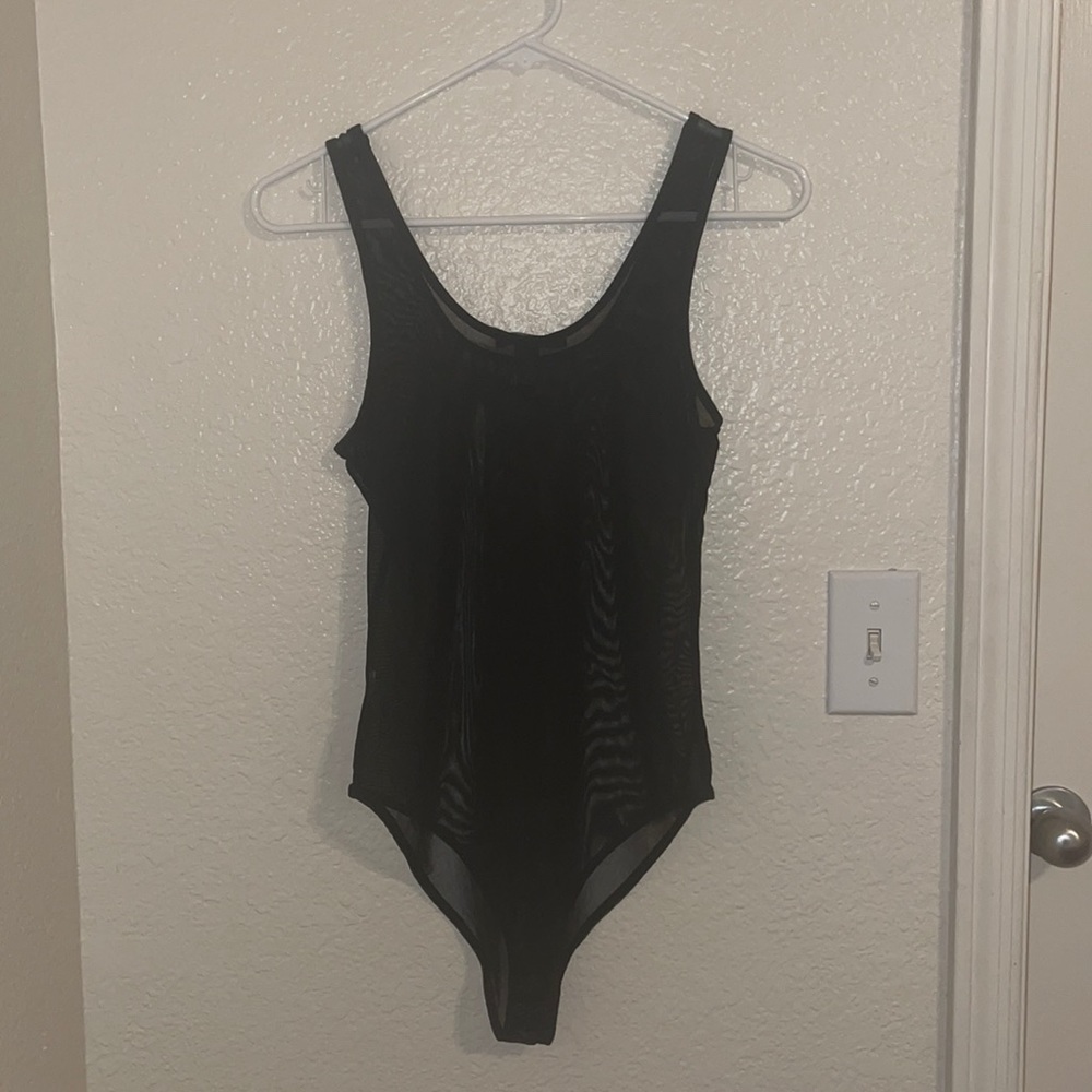 NWOT Sheer bodysuit. Never been worn